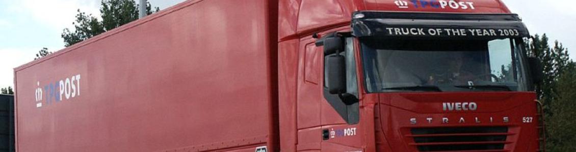 iveco articulated lorry on the road transporting freight